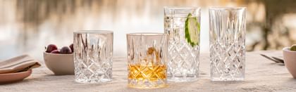 NACHTMANN Noblesse tumblers and long drink glasses in an outdoor setting